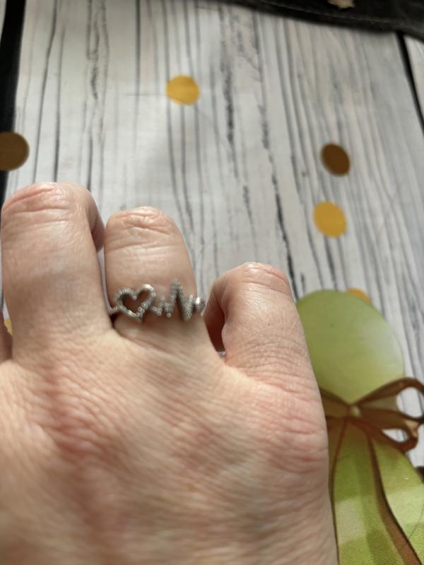 0.065 CT. T.W. Diamond Heartbeat and Heart Ring in Sterling