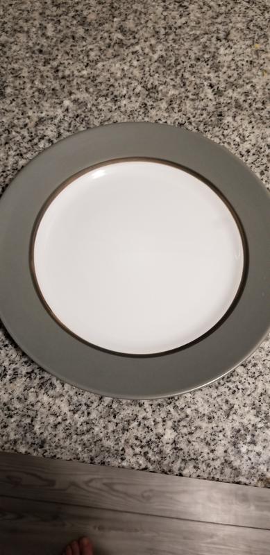 Grey spots on plates and small discoloration.