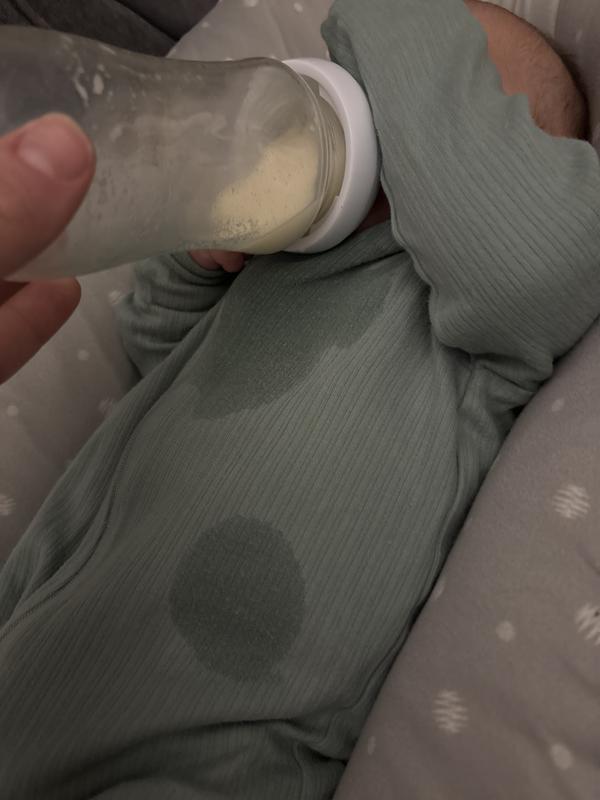 Just changed his clothes from the last bottle leaking and with this new bottle and new outfit, it happened again