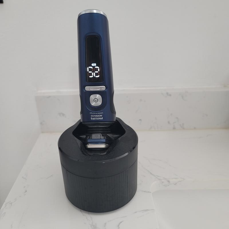 Inside the cleaning unit, which acts as a stand. I clean it every 3 days with shaving everyday, so that works well for me.