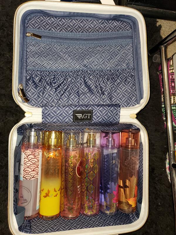 Cosmetic case holds 6 full size body sprays, for size reference.