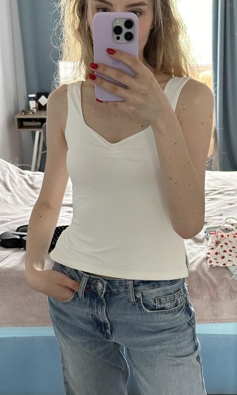 Customer photo for "Comfortable and versatile top. Material"