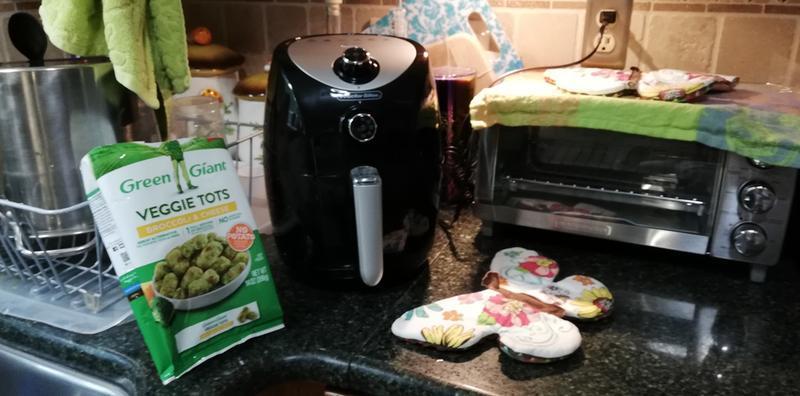 This picture shows the space it takes on the counter and I used the entire bag of tots for my fryer and they all had sufficient room and extra if you wanted to add more, but you do not want to cram it full.