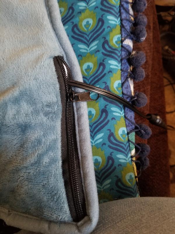 If the cord moves the pocket comes out and looks bad.