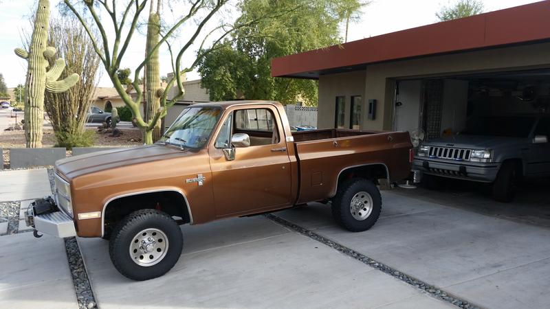 Old ('82) in drive way new ('95) in garage