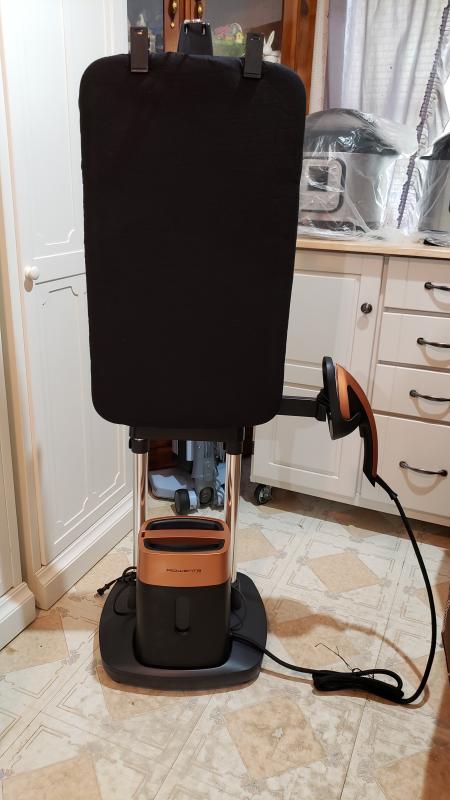 The holster for the iron head can be stored this way or it swivels for out of sight storage behind the Smart Board.