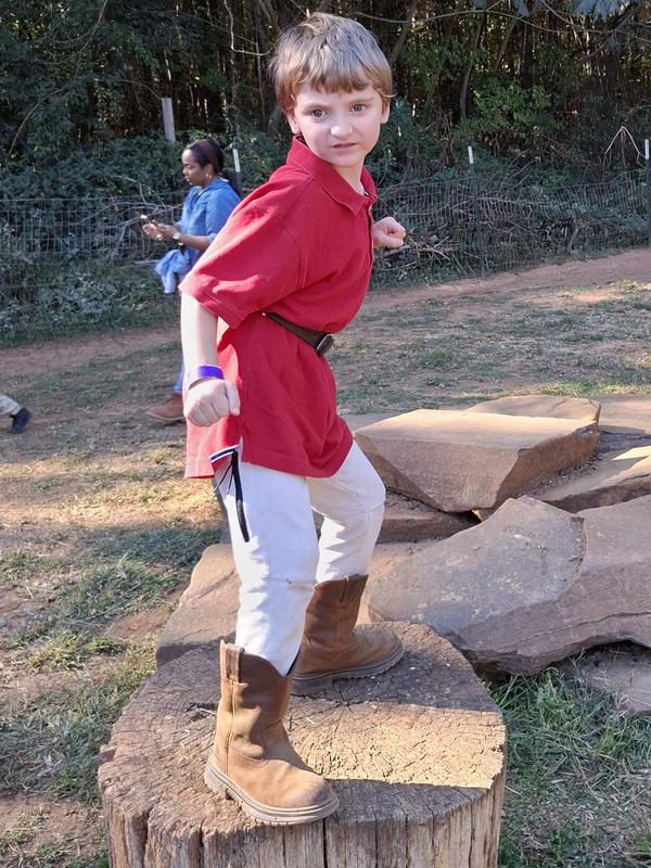 Super hero pose with boots