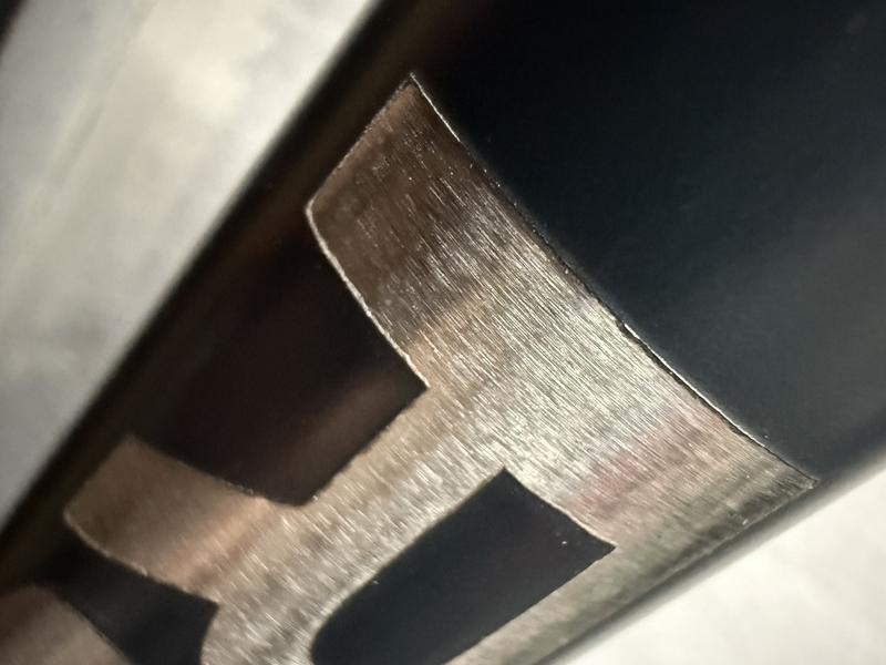 Close-up of the logo cut out and lip