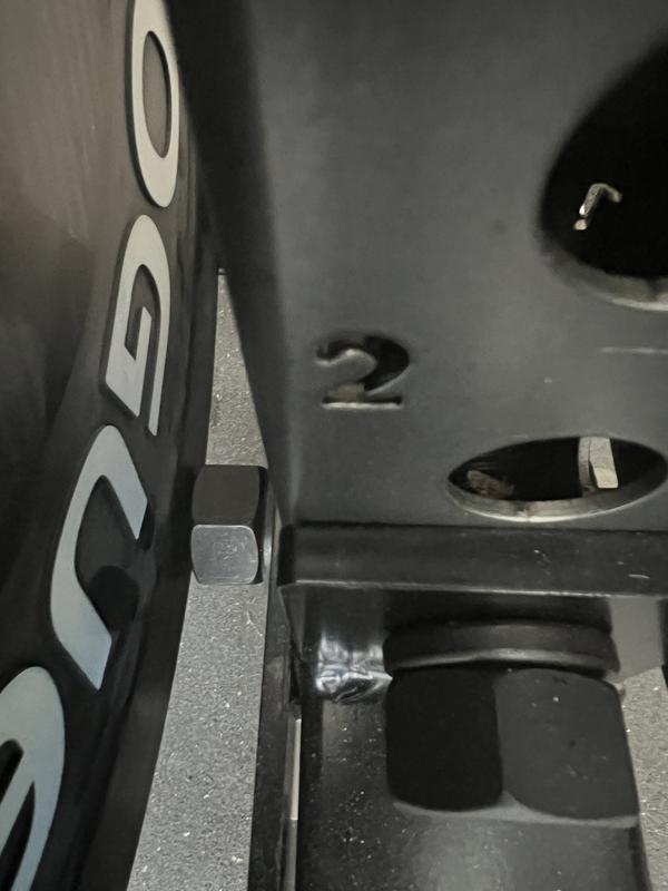 Bolt is in the way so the bumper plate can’t sit flat against the upright
