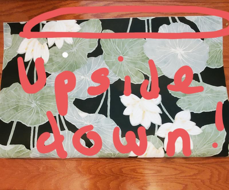 The paper is backward on the roll