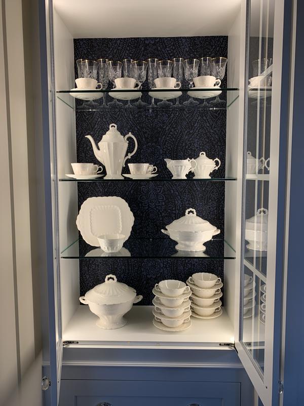 Pretty accents on a small amount of wall in a butlers pantry and in the back of dining room cabinets. Really makes the white china pop!