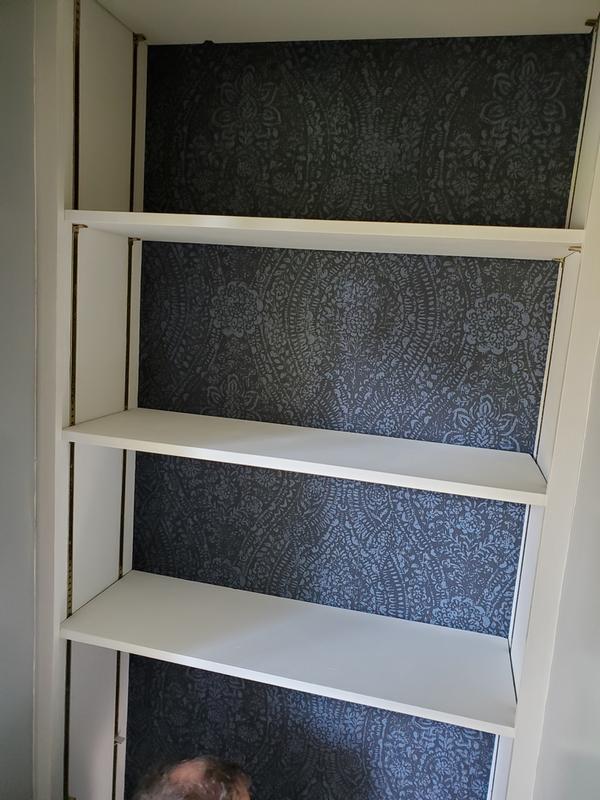 back of our bedroom bookshelf, after shelves added.