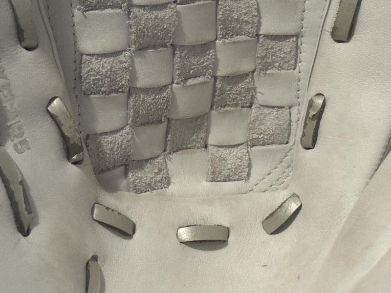 Metallic coating on laces peeling off.