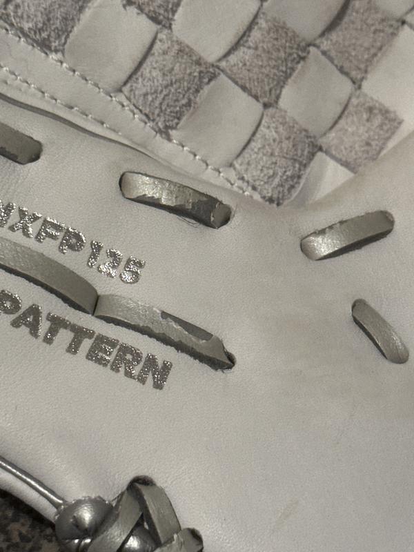 Metallic coating on laces peeling off.