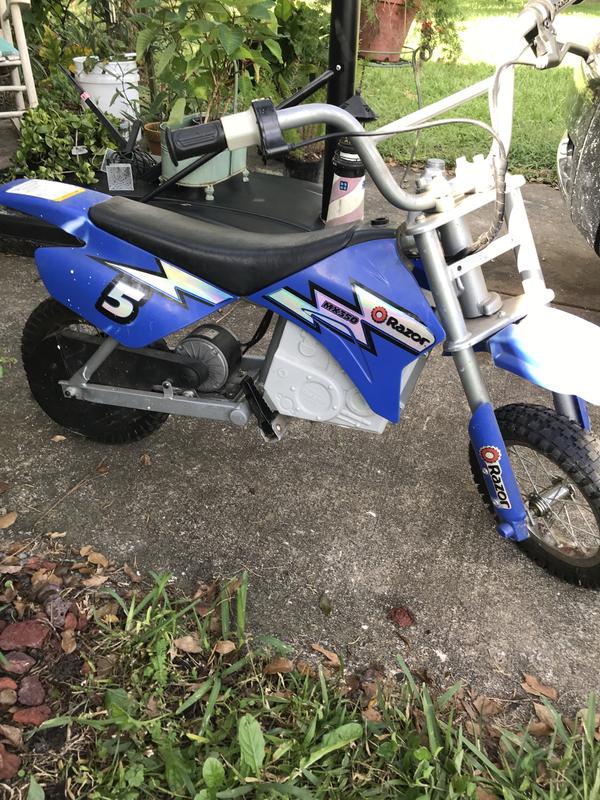 Razor MX350 Dirt Rocket Electric Motocross Off-Road Bike for Age 13+, Up to  30 Minutes Continuous Ride Time, 12 Air-Filled Tires, Hand-Operated Rear