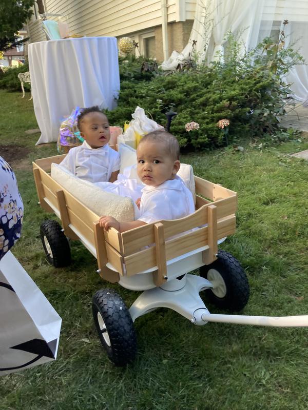 Ringbearers in wagon.