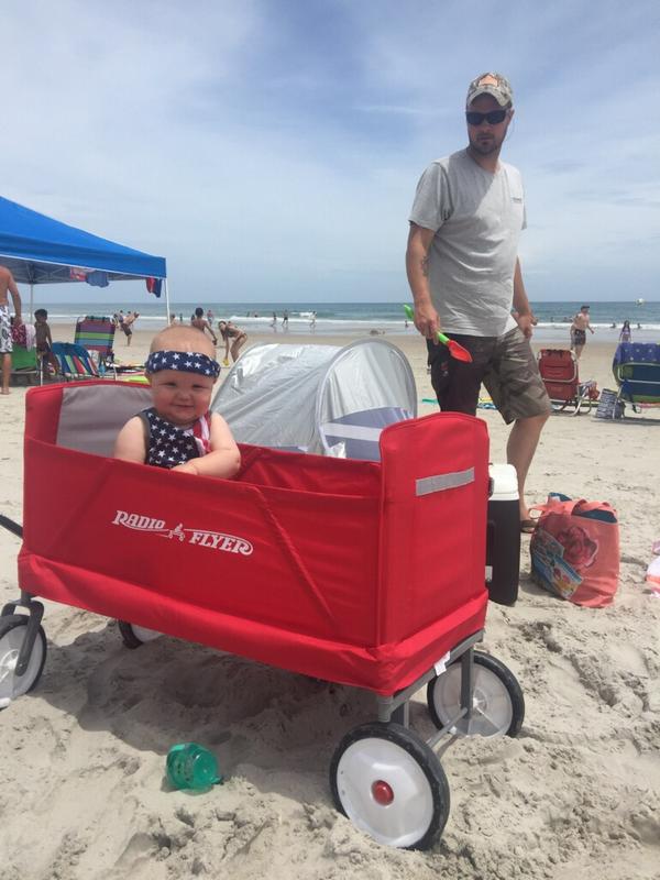 We're at the Beach! Daddy said, "it pulls Great in the Sand"