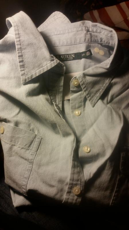 Bad lighting,  but this shirt is a beautiful pale blue.