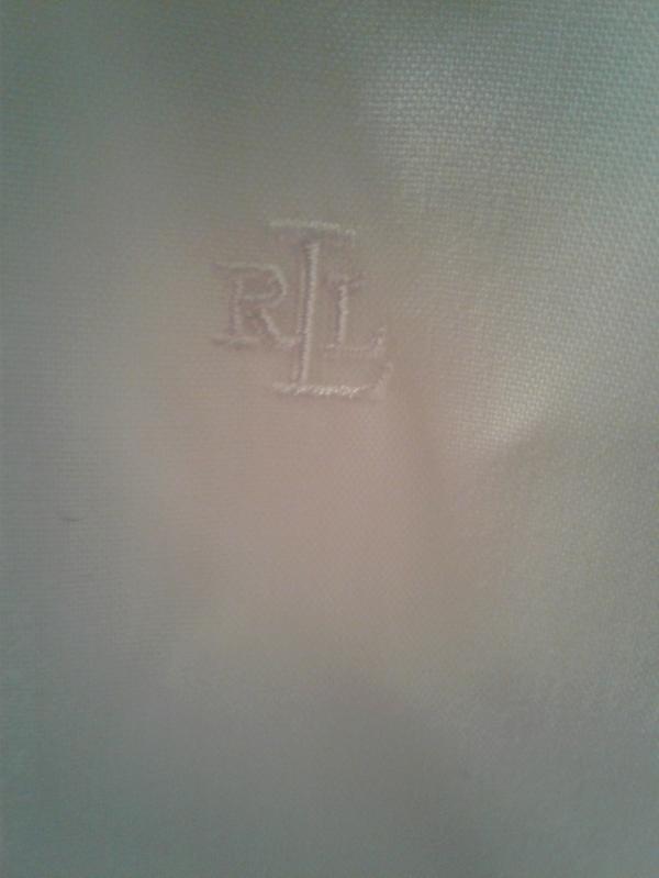 Rl logo on chest.