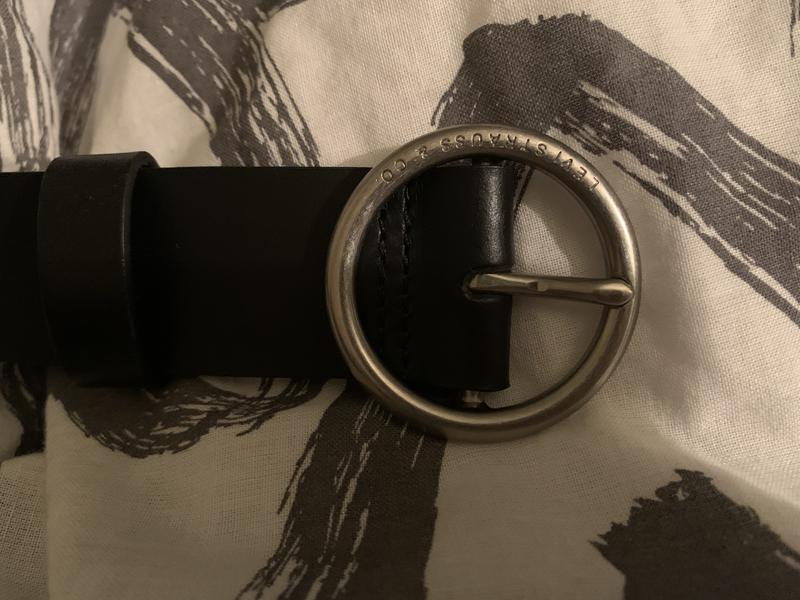 Buckle has company name engraved