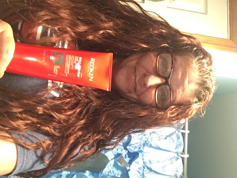 My hair dry, shiny, and frizz free after using REDKEN Frizz Dismiss Mask Masque