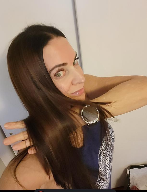 After blow drying with Redken Spray Smooth
