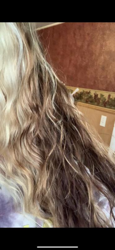 My hair looked way less frizzy and actually shiny