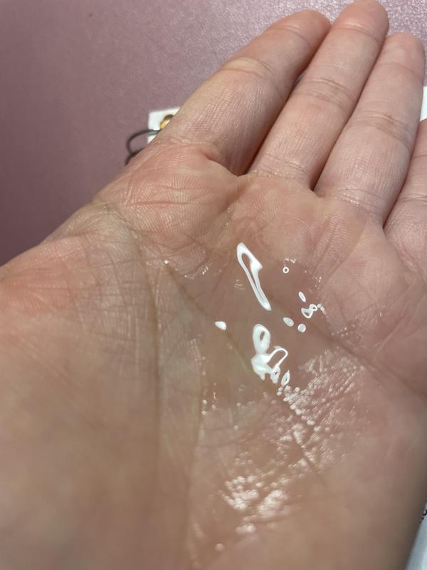 The serum is thin, light, non-sticky, and has a gentle scent