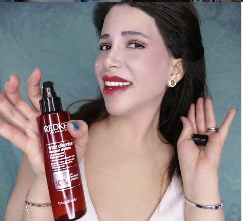 Myself using my Redken Frizz Dismiss