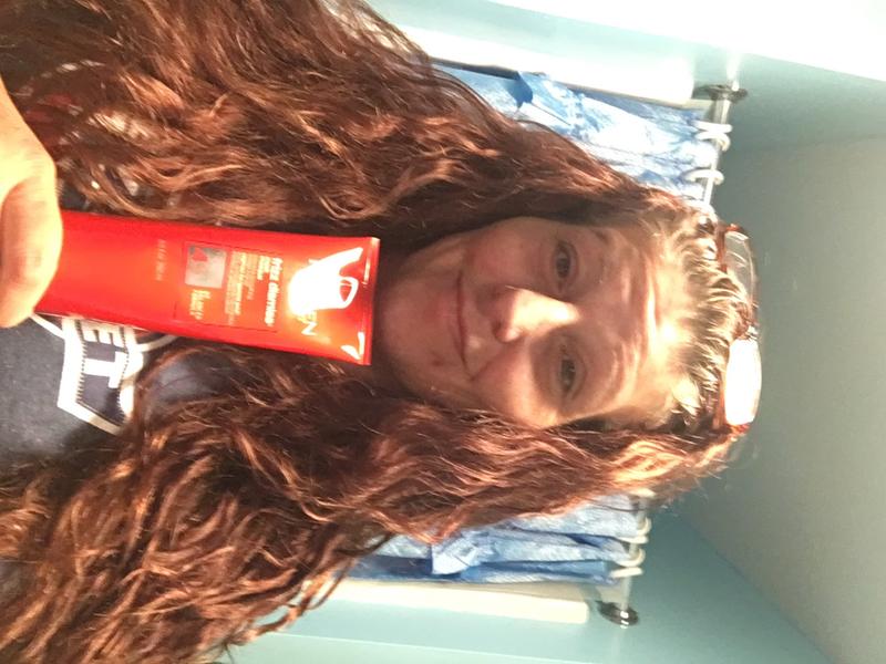 My hair dried with REDKEN Frizz Dismiss Mask Masque
