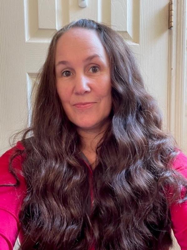 With spray as a curl setting spray before blow drying and styling.