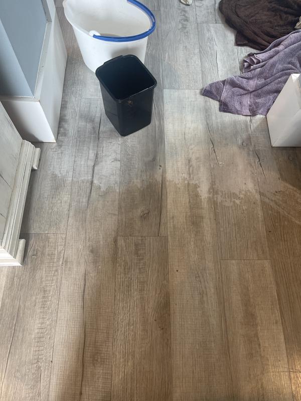 The brown residue is rejuvenate buildup. The gray floor is a ER I used Zep stripper