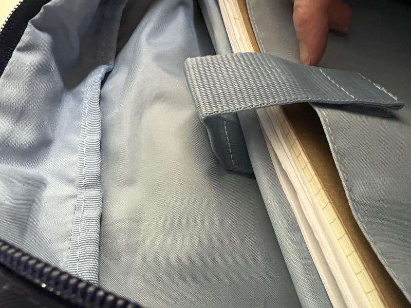 Gap created when you have a thin laptop and a few papers.