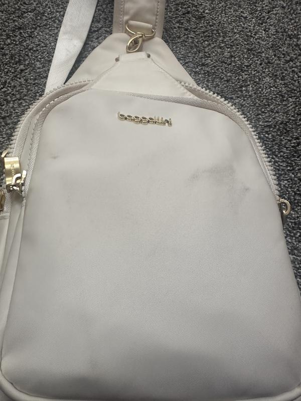 Customer photo for "Love the purse but not the color"