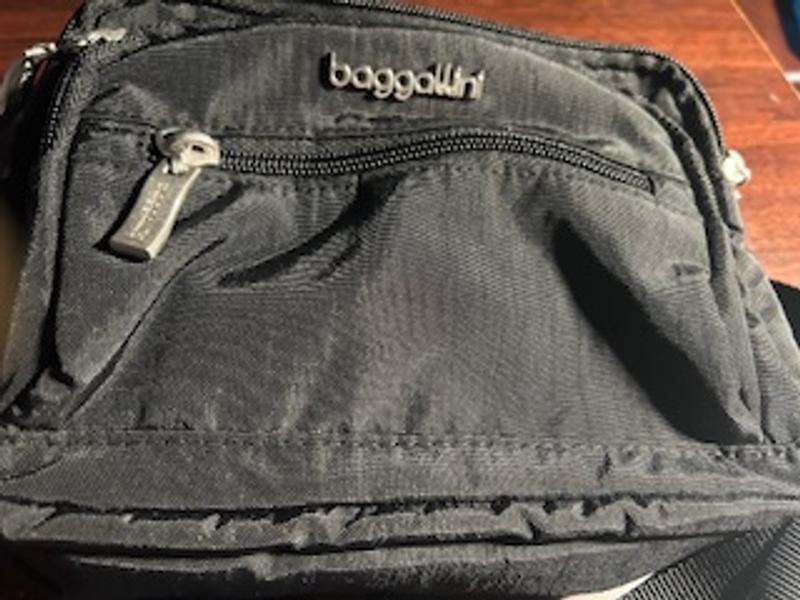 Baggalini bag with strap ripped