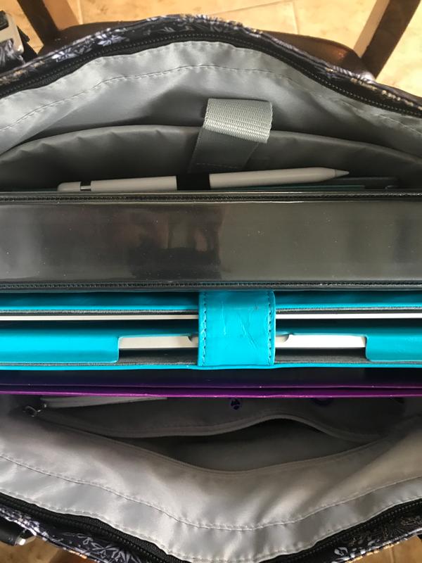 Notebook, computer, iPad and pens, folder, a few other nicknacks