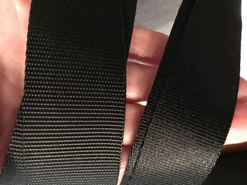 Handle on left is original design; right side of picture is the handle on my new purse. It is much more slippery and will be prone to shredding or fraying.