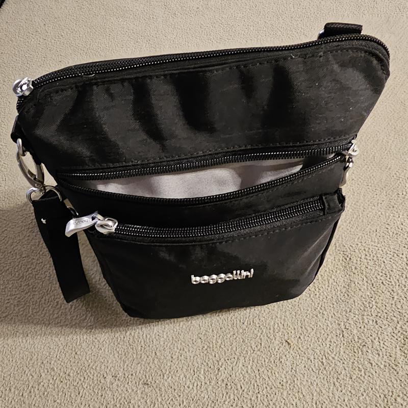 Large front pocket...will hold my LARGE Samsung phone & case perfectly!