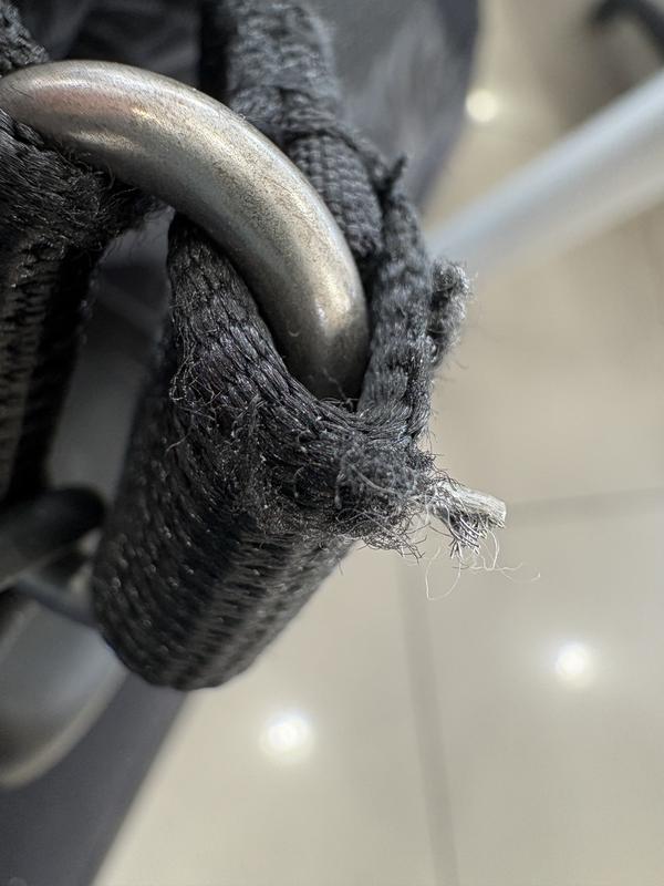 mesh breaking through outer strap layer