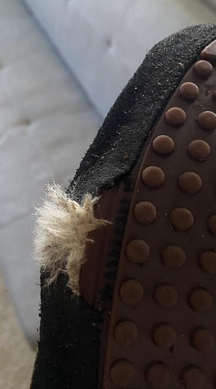 The tear, which has since worsened. This happened to two pairs.