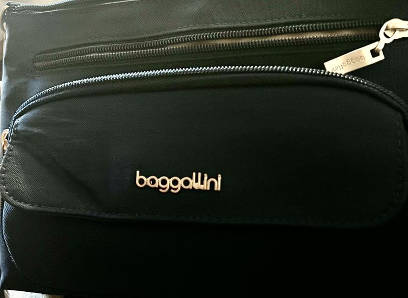 Purse with fold in left corner flap