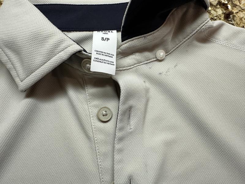 Customer photo for "Black cloth staining in and around collar"