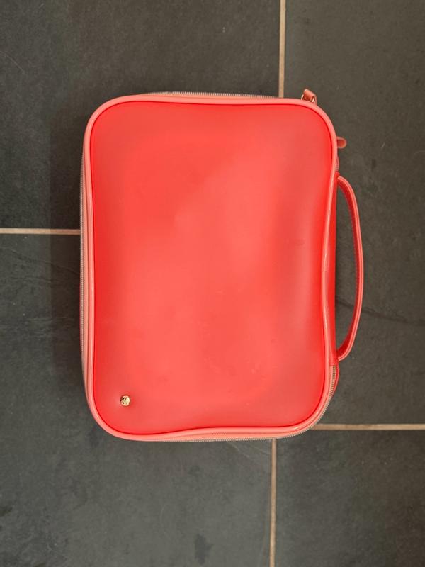 Customer photo for "These bags hold a lot of make up and bathroom items."