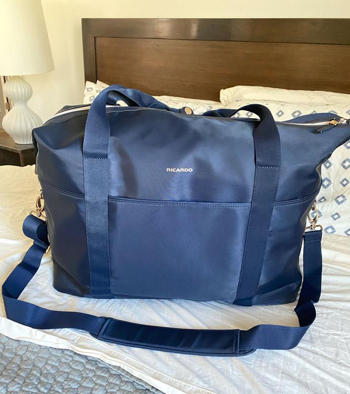 Not your typical duffel – stylish shape and several strap options