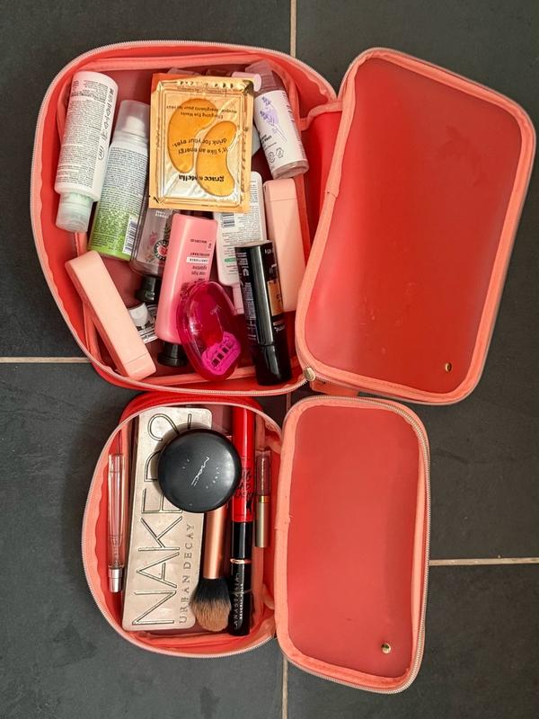 Customer photo for "These bags hold a lot of make up and bathroom items."