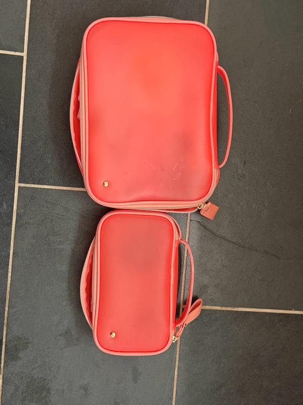 Customer photo for "These bags hold a lot of make up and bathroom items."