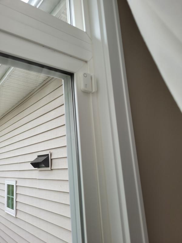 Patio door with contact sensor