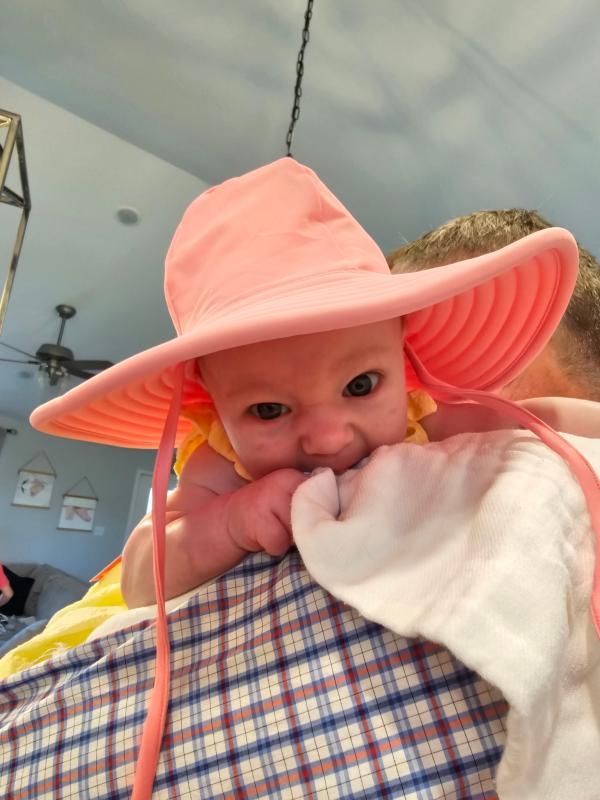 Customer photo for "Bubblegum Pink Swim Hat - 0-12m"