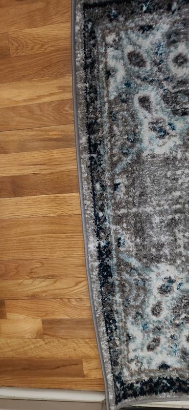 The bottom end is almost 1" longer than the top end, and the edging designs are not uniform. Poorly made and very lumpy. Love the design, just not the quality.