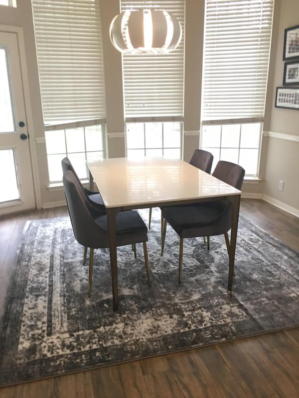 The actual rug is lighter than it appears here. My updated kitchen nook!